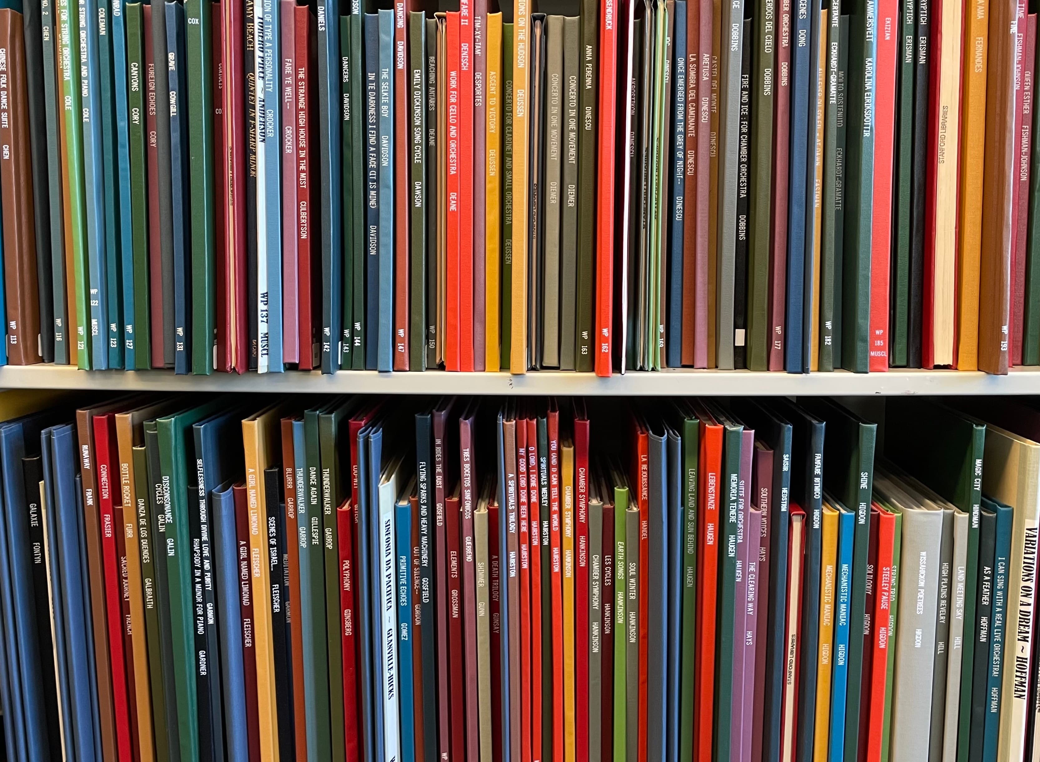 Bound scores on a shelf